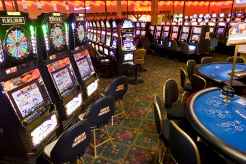 A picture of slot machine games in a casino.